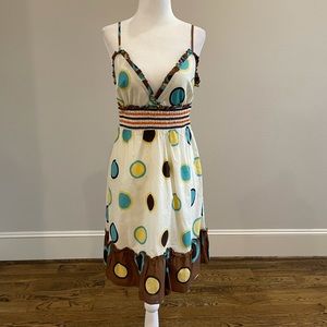 Whimsical dot and ruffle strap dress